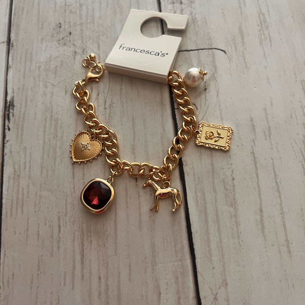 Francesca's Collections Gold Bracelet with Red Gem and Charms - Picture 2 of 4